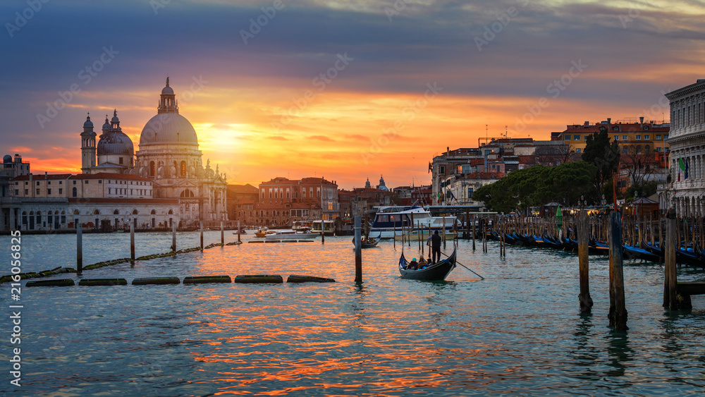 Fototapeta Canal with gondolas in Venice, Italy. Architecture and landmarks of Venice. Venice postcard with Venice gondolas.