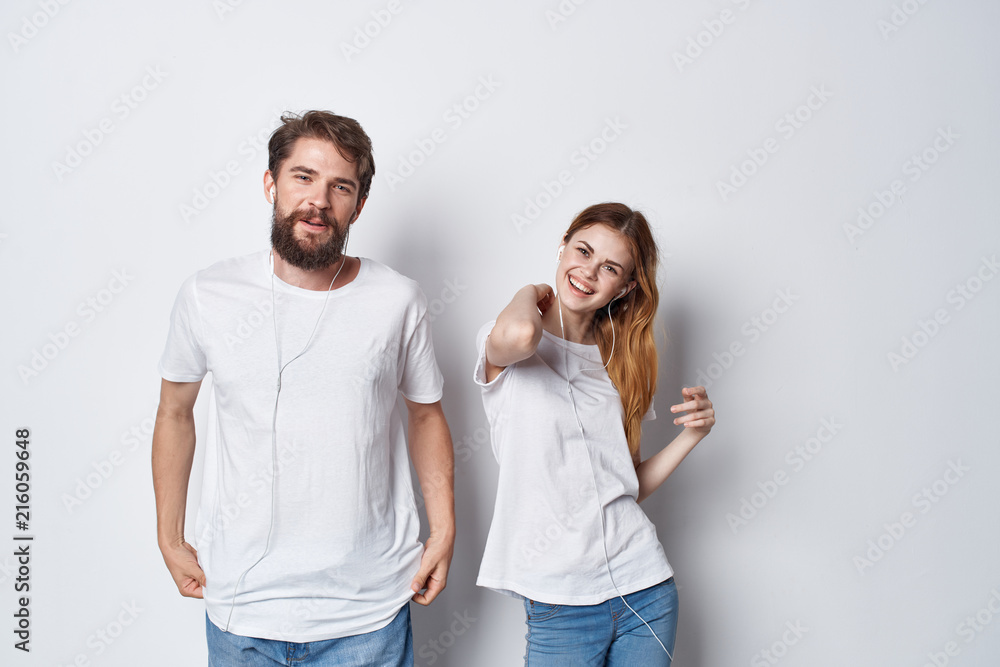 young couple in white t-shirts young couple in white t-shirts