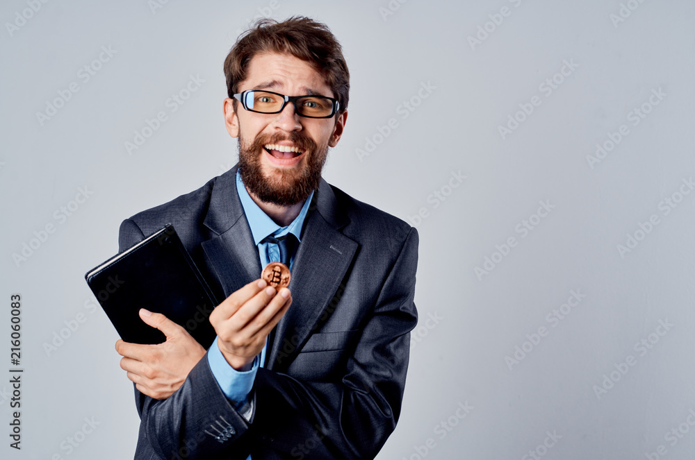 business man in glasses with a beard bitcoin documents smile business man in glasses with a beard bitcoin documents smile