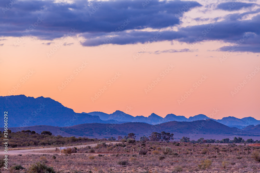 Layers of rugged mountain peaks of Flinders Ranges in South Australia at dusk