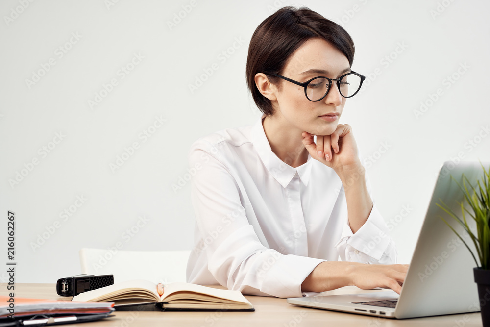 business woman with glasses working business woman with glasses working