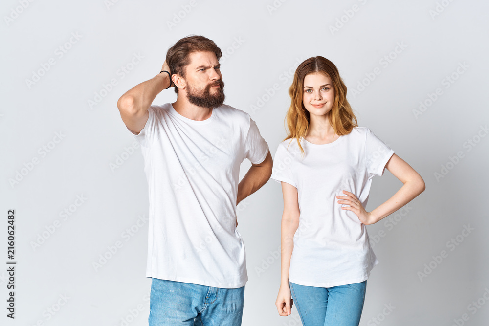 young couple in white t-shirts