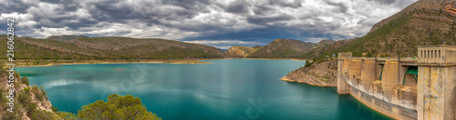 Panorama of the beautiful blue Loriguilla Reservoir and dam in the mountainous Spanish area near Chulilla  Spain