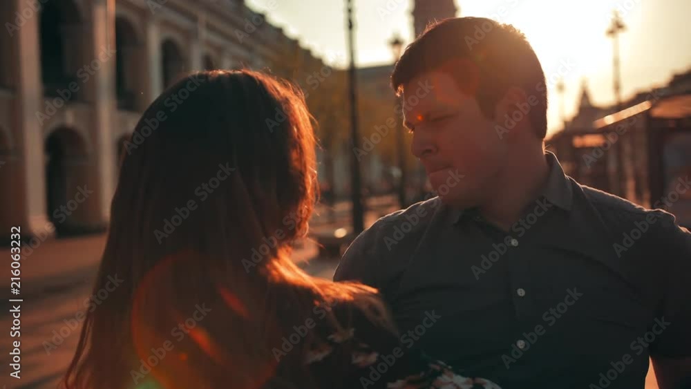 Love is in the air! Cute romantic couple spending time together in the city. male and sexy female hugging, kissing and having fun during the sunrise. Love is in the air! Cute romantic couple spending time together in the city. male and sexy female hugging, kissing and having fun during the sunrise.