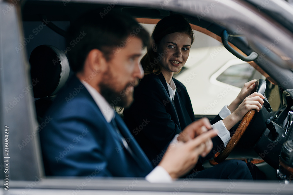 woman man colleagues in car woman man colleagues in car