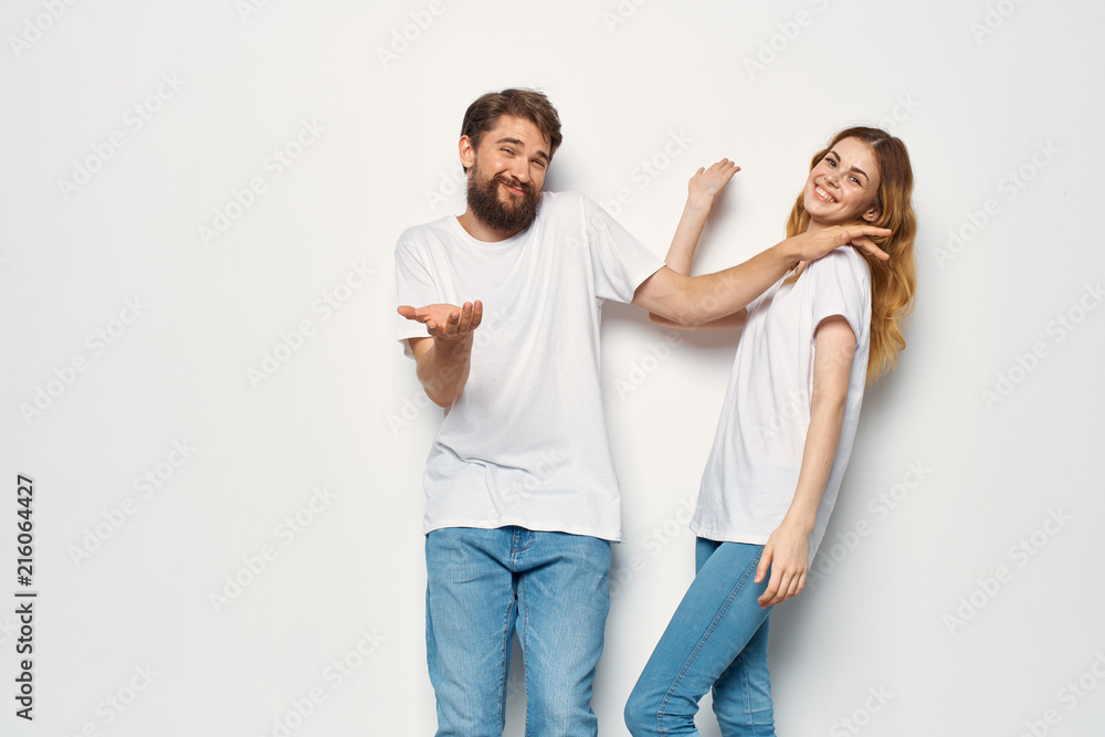 woman man in white t-shirts logo woman man in white t-shirts logo