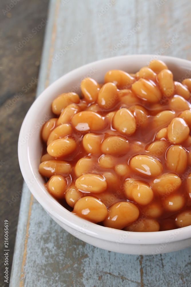 baked beans in tomato sauce in white dish baked beans in tomato sauce in white dish