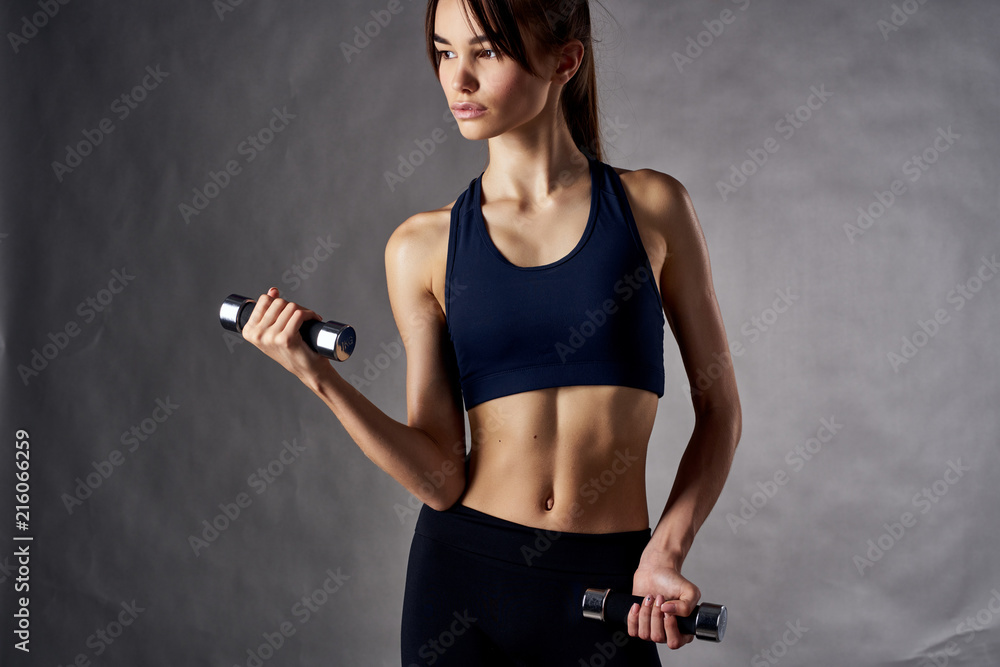woman with sport dumbbells woman with sport dumbbells