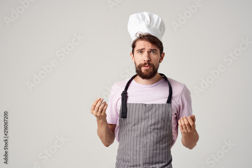 cook in uniform in the kitchen