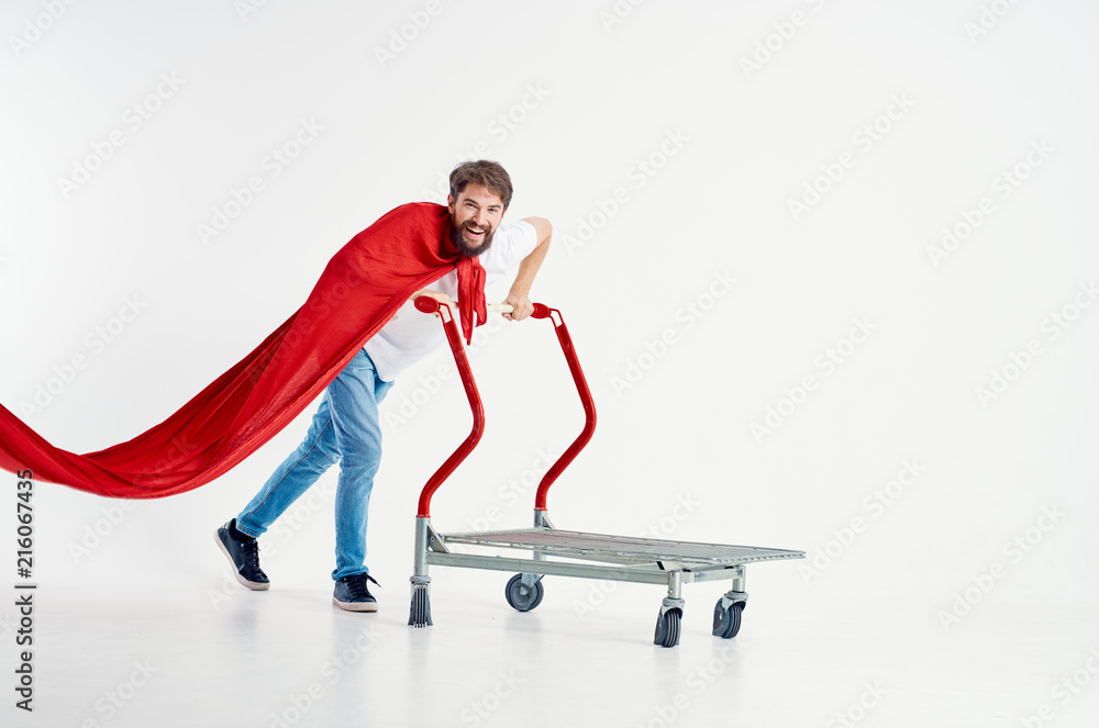man hero carries trolley on white background man hero carries trolley on white background