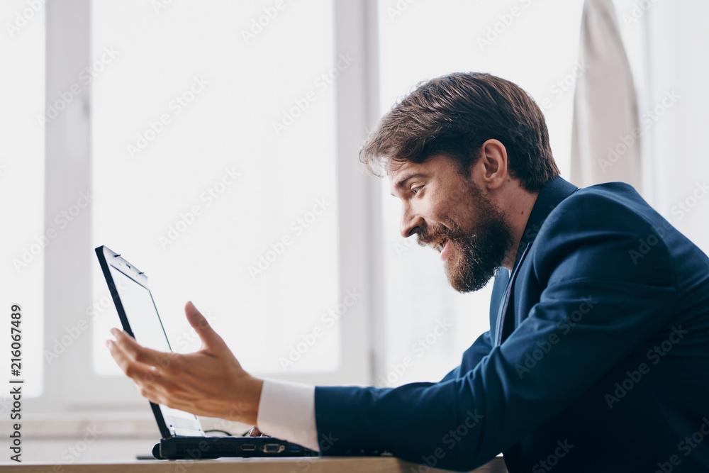 Fototapeta premium business man working on a laptop