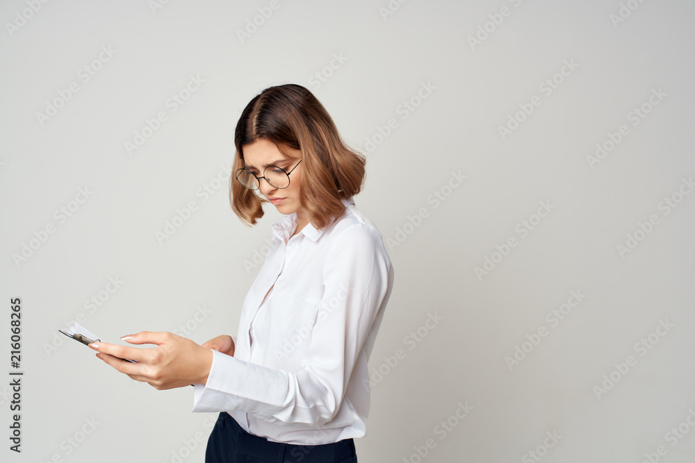 business woman with glasses in a white shirt business woman with glasses in a white shirt