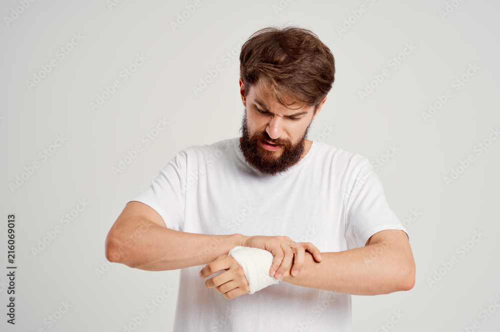 man bandaged hand bruised injury pain man bandaged hand bruised injury pain