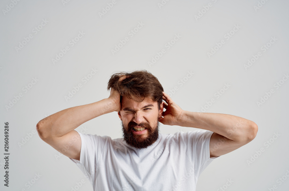 a man with a beard is scratching his head a man with a beard is scratching his head
