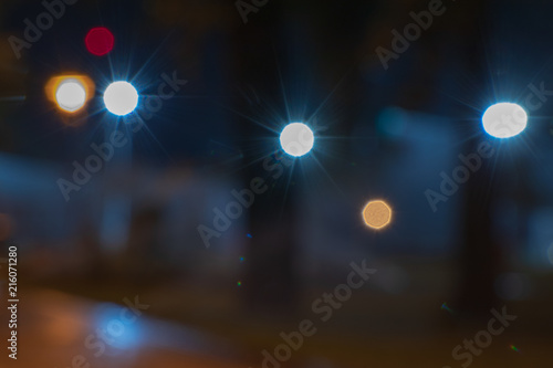 background. defocus. night in the park. light of street lamps
