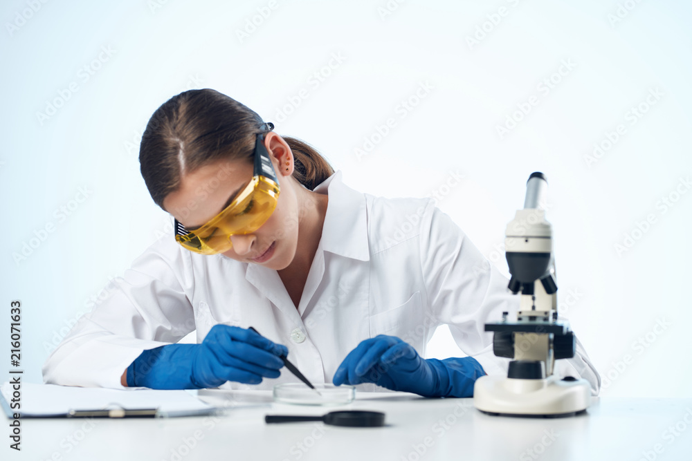 scientist in laboratory with test tubes scientist in laboratory with test tubes