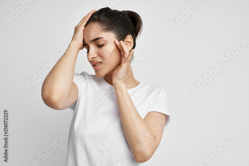 woman with a headache © SHOTPRIME STUDIO