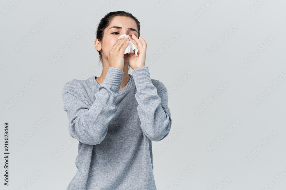 woman blows the flu woman blows the flu