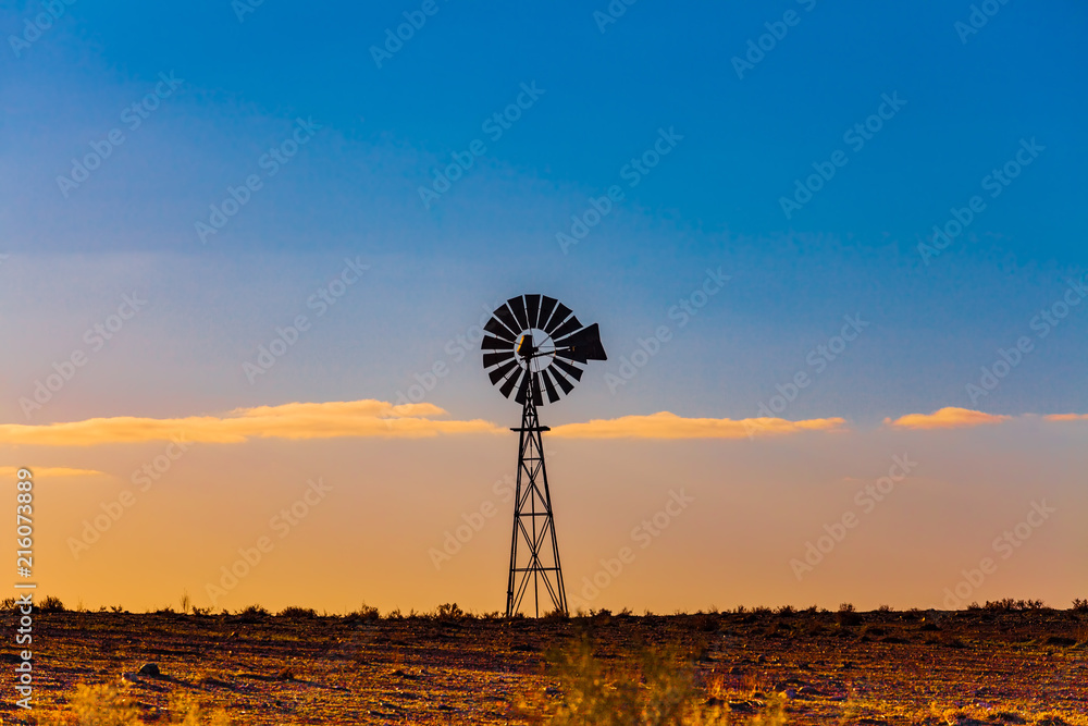 Windmill in South Australia at sunset Windmill in South Australia at sunset