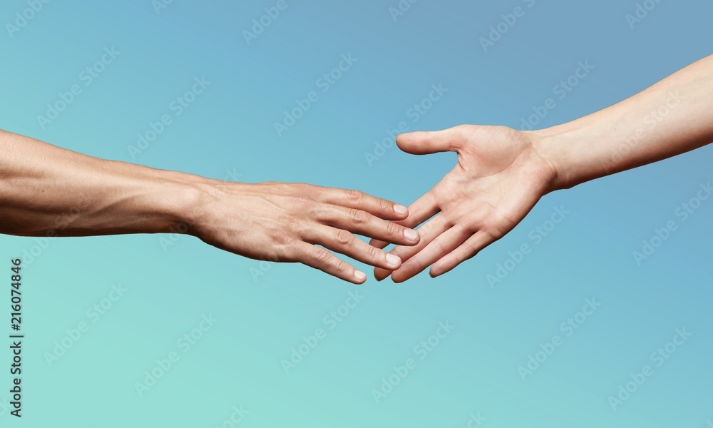 Hands of man and woman reaching Hands of man and woman reaching