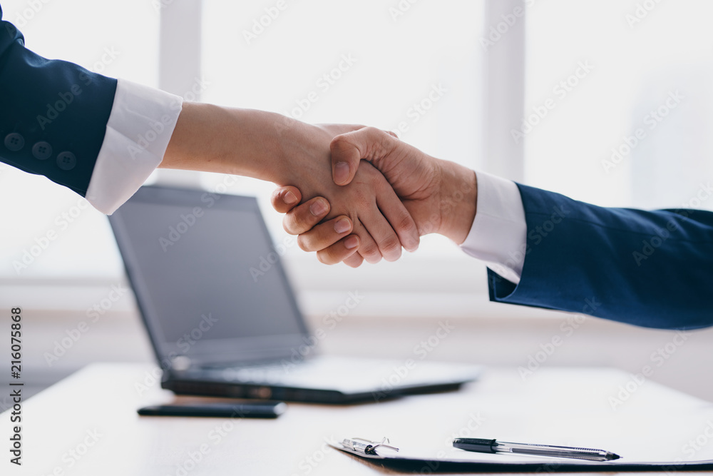 business handshake talks