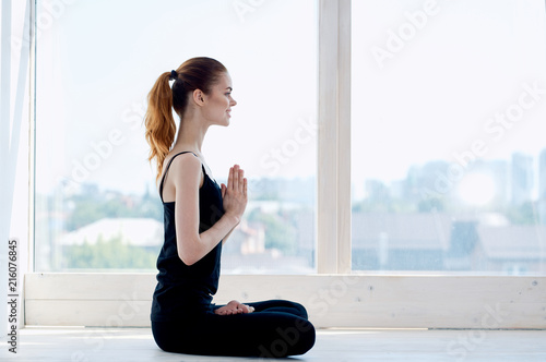 Free Download a woman meditating in a bright room the energy of purification - GFXLoad