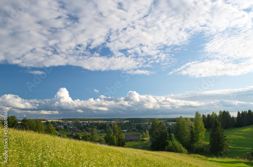 Strawberry clearings with blue sky and white clouds