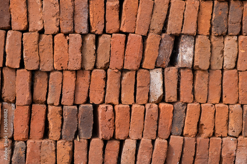 Old red brick wall texture background. Stonewall made from Solid clay bricks used for construction.