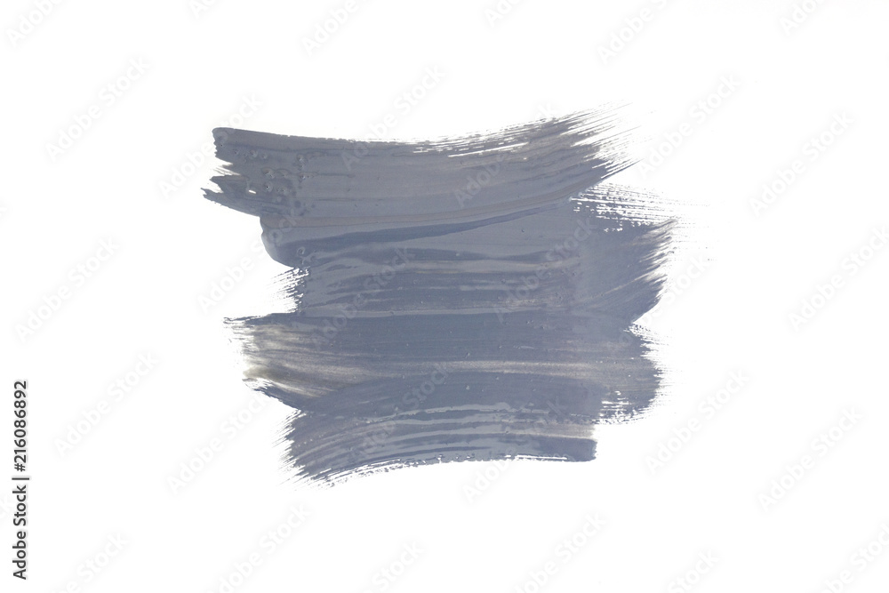 Grey abstract brush stroke isolated on white.