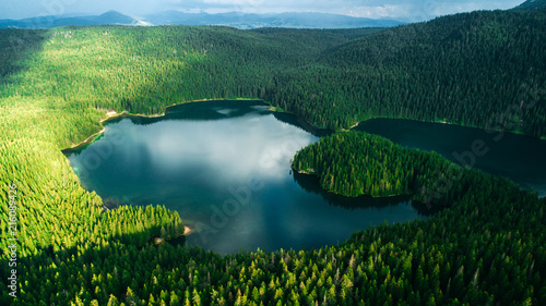 Fototapeta Naklejka Na Ścianę i Meble -  Aerial view at a beautiful lake in the mountains. Black Lake, Montenegro.