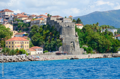 Fototapeta Naklejka Na Ścianę i Meble -  View of resort town of Herceg Novi and fortress of Forte Mare from sea, Montenegro