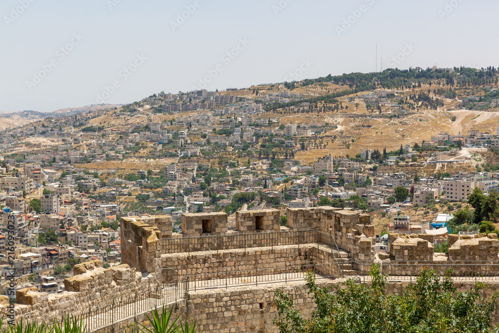 Wall of old city and neighborhoods of East Jerusalem