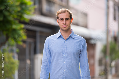 Young businessman in the streets outdoors