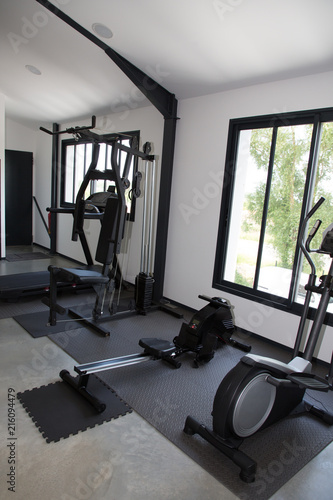 Empty modern gym interior with equipment And Machines
