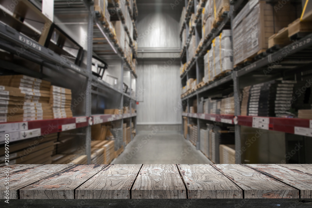 Empty wood Shelf on storage warehouse background