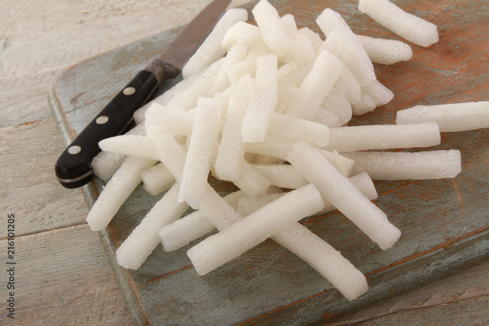 preparing fresh white raddish preparing fresh white raddish