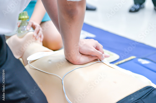 Basic Life Support of Demonstrating chest compressions on CPR doll