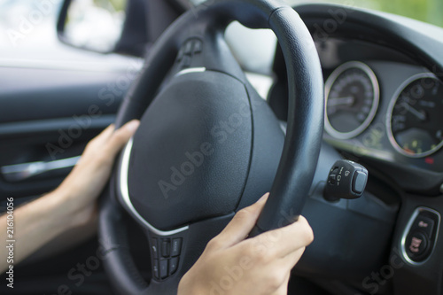 man hands driving the car