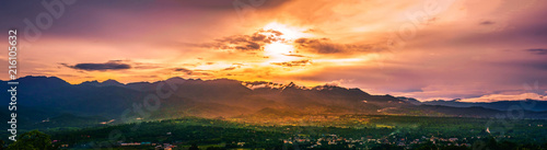 Panoramic Landscspe of thailand rural scence : Mountain rang behind the valley during Sunset