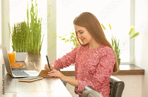 Female freelancer working o...