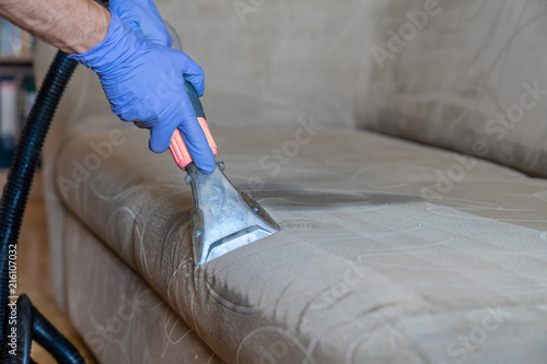 Closeup of upholstered Sofa chemical cleaning