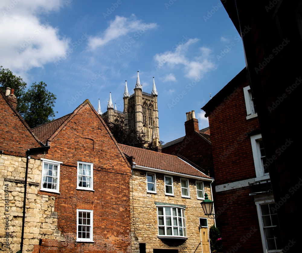 Naklejka premium A spire of Lincoln Cathedral as seen from halfway up Steep Hill