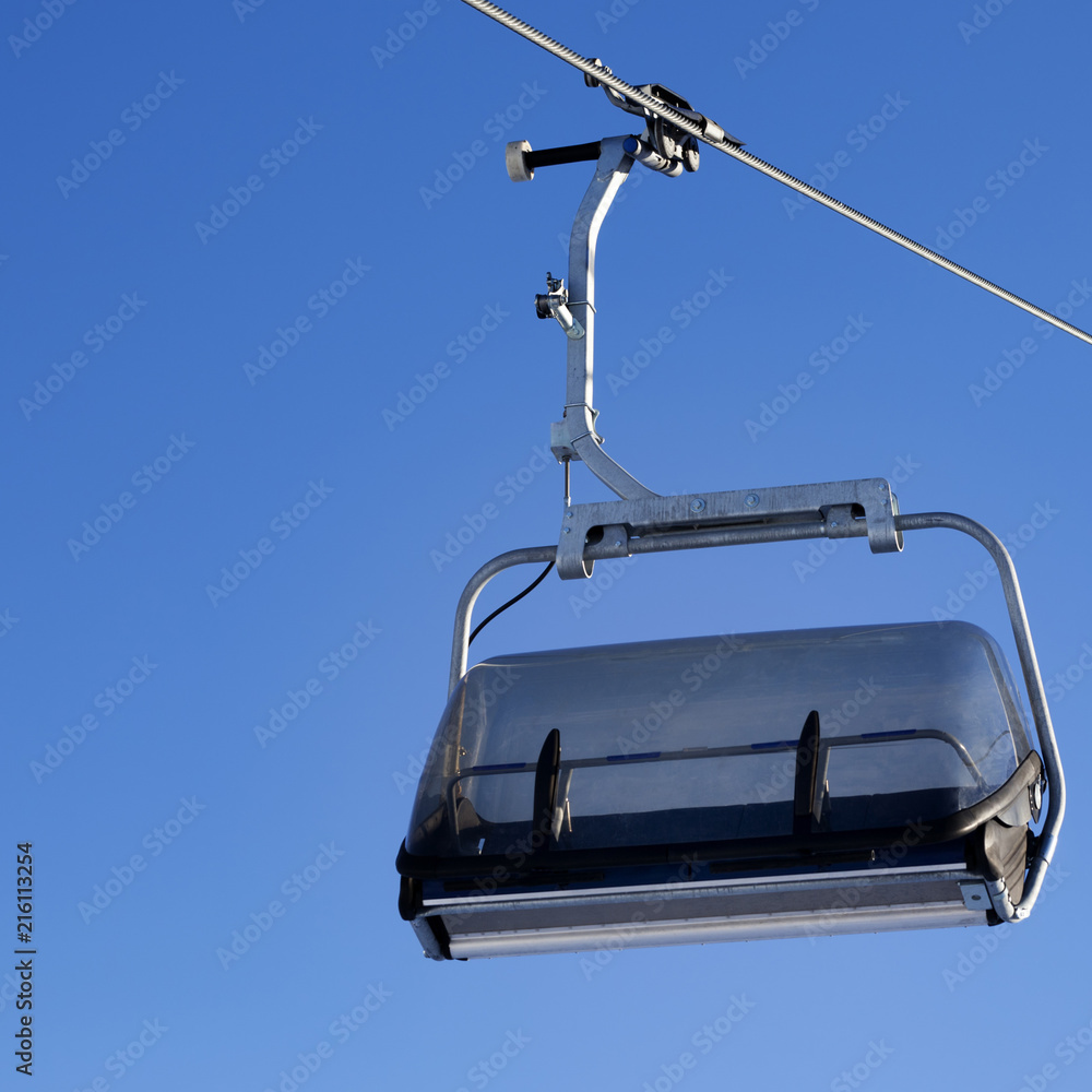 Chair-lift and blue sky