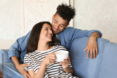 Happy young couple relaxing...