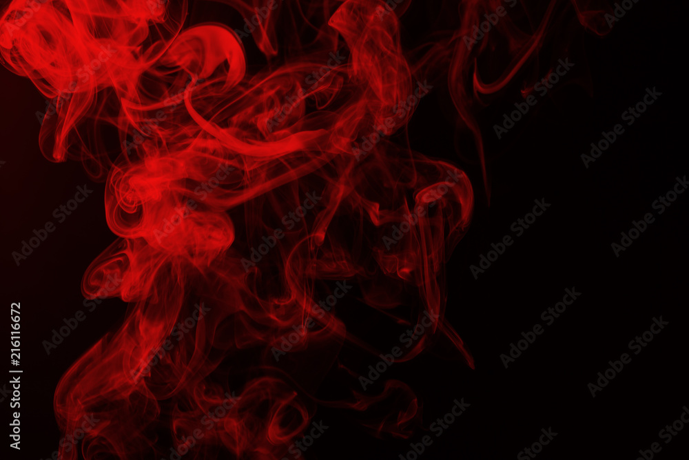 Red smoke abstract on black background, fire design and darkness ...
