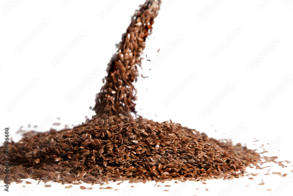 Some linseeds flax spread out on white isolated background Some linseeds flax spread out on white isolated background