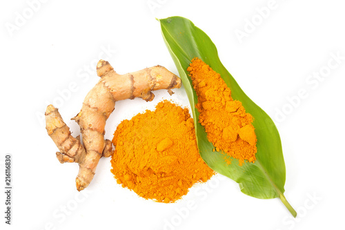 Turmeric powder and fresh turmeric (Curcuma) on white background. herbal photo