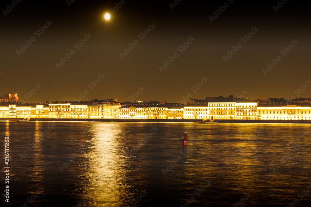 Photography of long-term exposure - night landscape. Night city river.