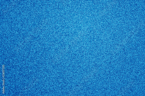 Denim fabric pattern stripes. Blue jeans textured background, bright backdrop, soft textile texture. Natural material wallpaper.