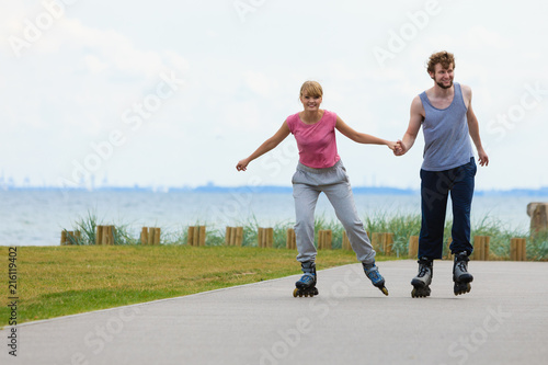 roller skater couple skating outdoor